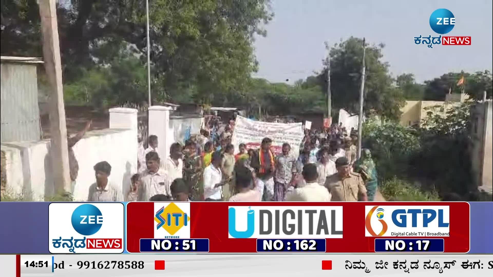 Protest demanding road repair in Koppal taluk