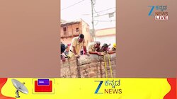 ಬಾವಿಗೆ ಬಿದ್ದ ಬೆಕ್ಕನ್ನು ರಕ್ಷಿಸಿದ ಸಿಬ್ಬಂದಿ