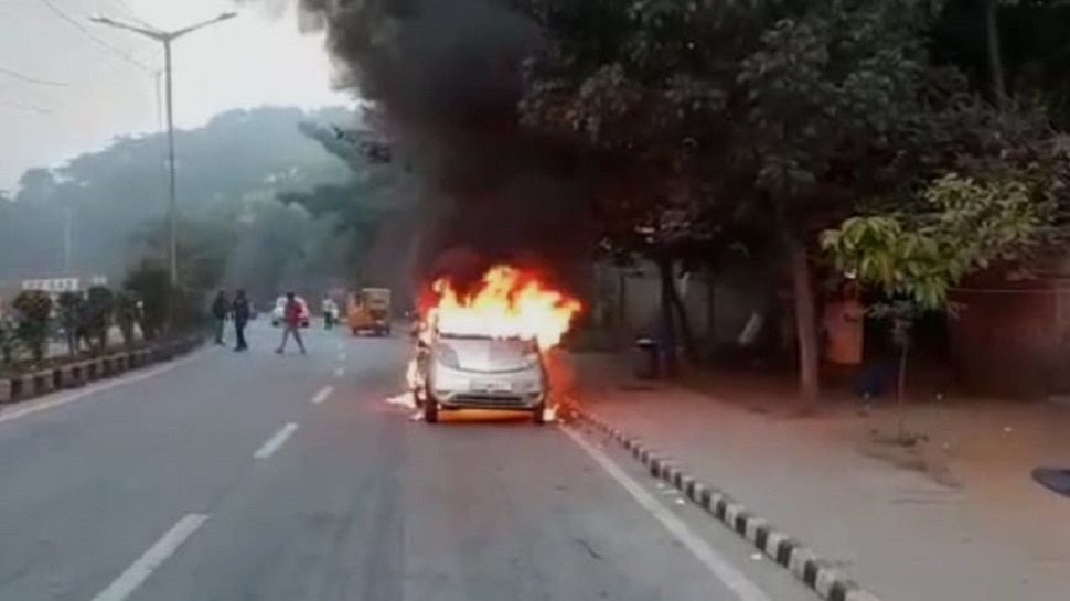 Fire in a Nano car on the main road in Bengaluru 