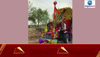 Puneeth Rajkumar photo on sugarcane cart