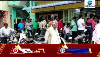 People queue for the purchase of mutton in Ramnagar