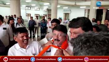 BJP MLAs put a saffron shawl on Congress MLA