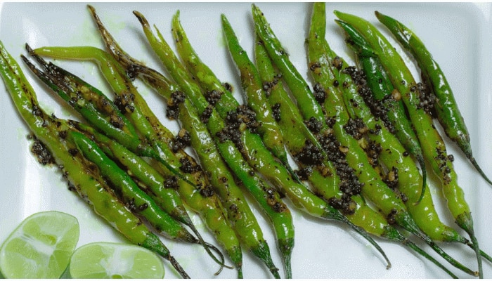 Fried Green Chilli Recipe: ನಿಮಗೂ ಮಸಾಲೆಯುಕ್ತ ಆಹಾರ ಇಷ್ಟವೇ, ಹಾಗಿದ್ದರೆ ತಪ್ಪದೇ ಟ್ರೈ ಮಾಡಿ ಫ್ರೈಡ್ ಗ್ರೀನ್ ಚಿಲ್ಲಿ