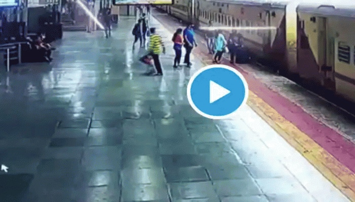 Watch CCTV Footage: ಚಲಿಸುತ್ತಿದ್ದ ರೈಲಿನಡಿ ಬೀಳುತ್ತಿದ್ದ ಮಹಿಳೆಯನ್ನು ರಕ್ಷಿಸಿದ ವ್ಯಕ್ತಿ..! title=
