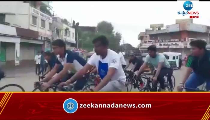 Vijayapur district collector Riding a bicycle to Start Har Ghar Tiranga Campaign 
