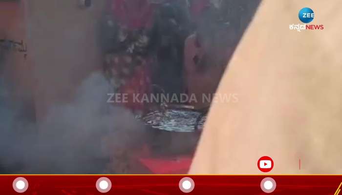Special tradition in siddapaaji temple - the priest puts his hand in boiling oil
