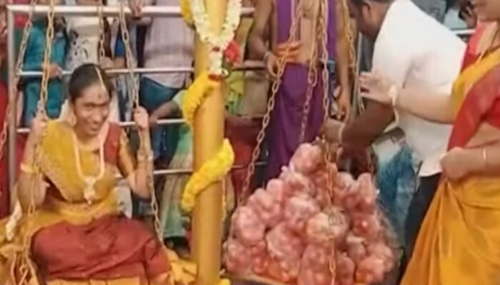 Viral Video: ಟೊಮೆಟೊದಲ್ಲಿ ಮಗಳ ತುಲಾಭಾರ ಮಾಡಿದ ತಂದೆ  