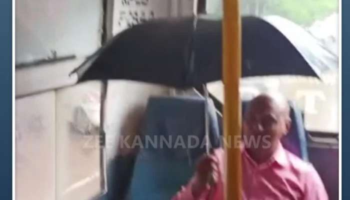 A passenger holding an umbrella in the bus video viral