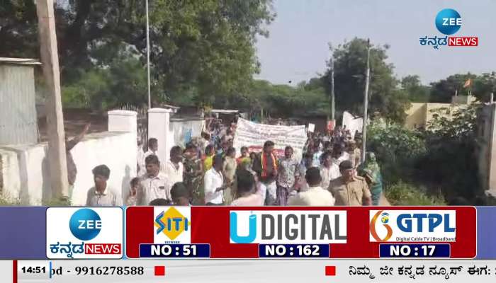 Protest demanding road repair in Koppal taluk